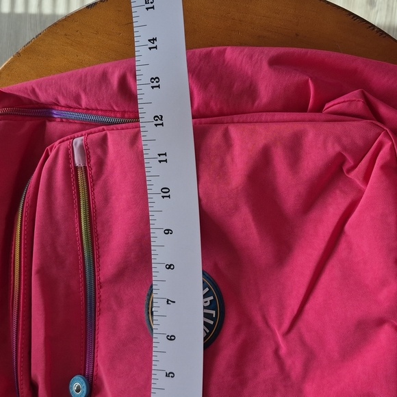 Kipling Bright Pink Nylon Backpack with Rainbow Zippers. NWOT